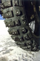 Michelin T63 rear tyre of Africa Twin. There are now 3.000 kms behind which can be seen from the wear of middle line studs.